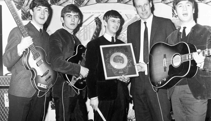The Beatles and George Martin.
Credit: Michael Ochs Archives/Getty